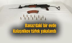 Banaz'daki bir evde Kalaşnikov tüfek yakalandı