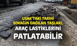 Uşak'taki tarihi sokağın dağılan Arnavut kaldırım tipi taşları araçların lastiklerini patlatabilir!