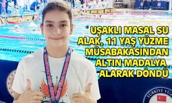 Uşaklı 11 yaşındaki Masal Su Alak, yüzmede altın madalya aldı